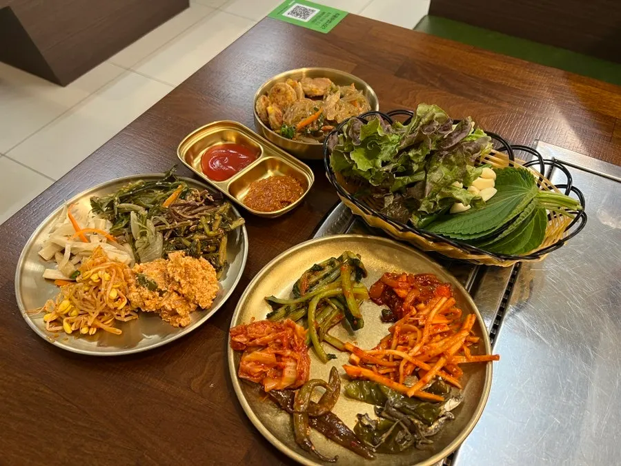 A tray of side dishes gathered from the self-serve bar