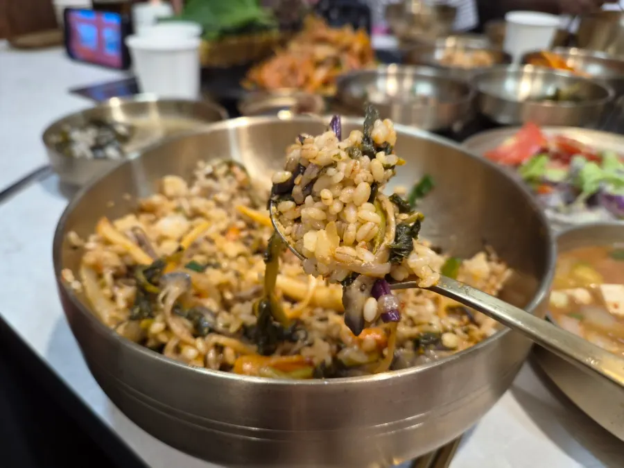 A finished bowl of barley bibimbap