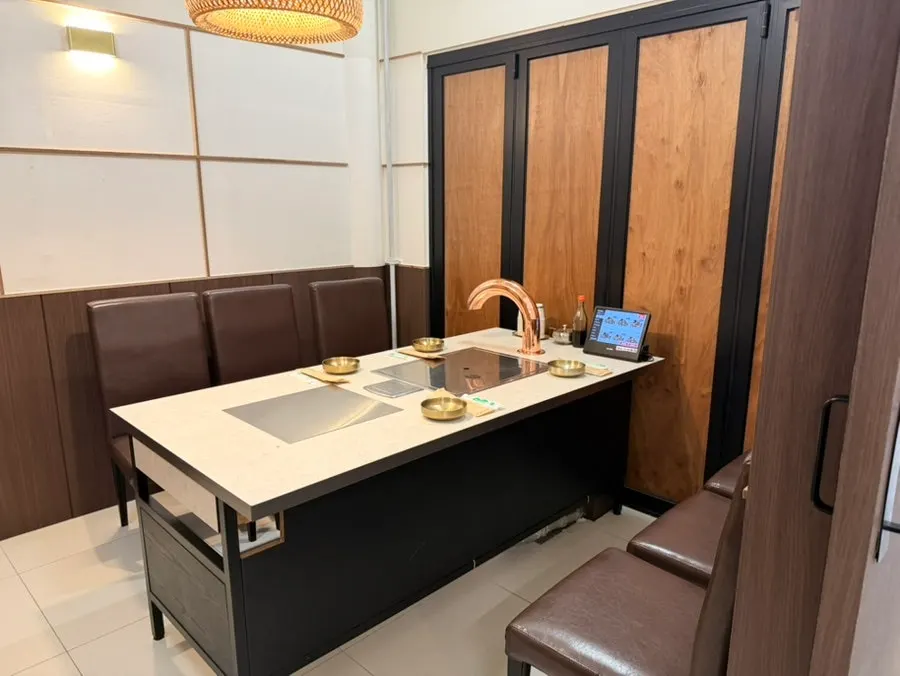 Inside Hwadamga with partitioned seating