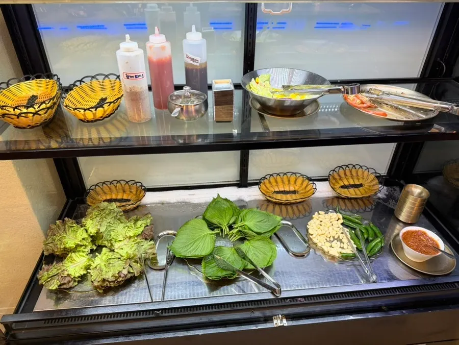 Hwadamga's self-serve bar with over 20 side dishes