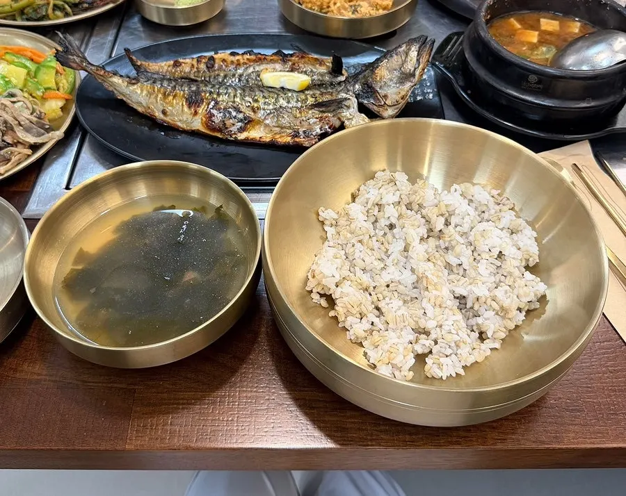 Set menu spread filled with self-serve bar side dishes