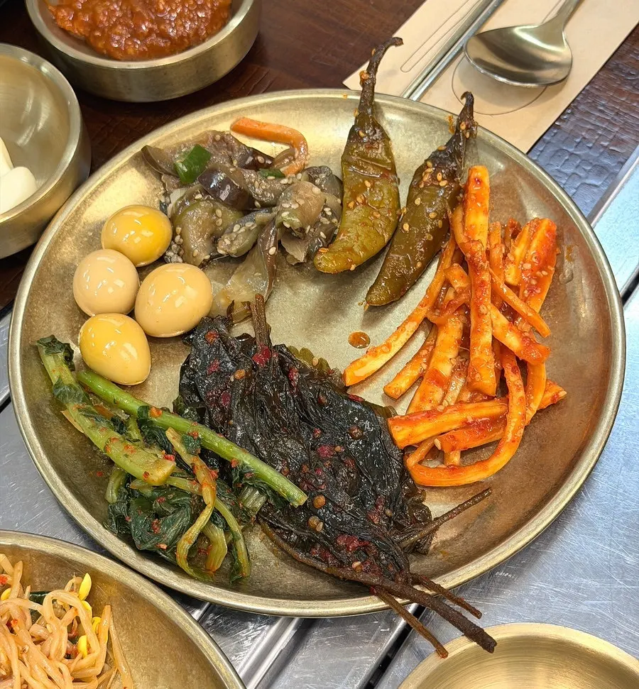 A wrap of pork stir-fry ready to eat