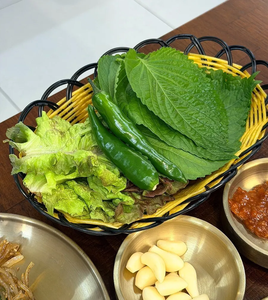 Pork stir-fry served with self-serve bar side dishes