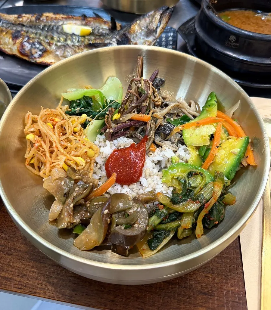 Seasoned vegetables and snail miso gathered for bibimbap
