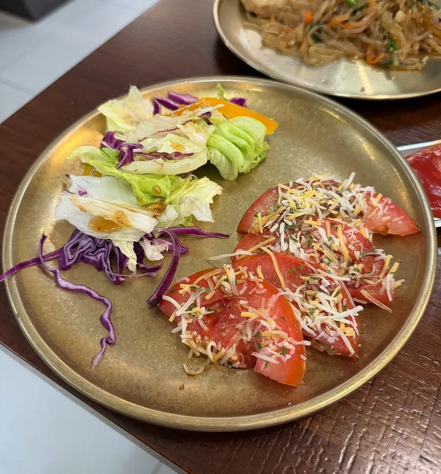 Meat patties and japchae from the self-serve bar