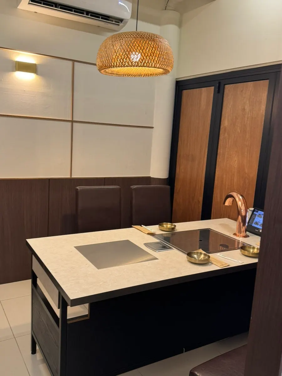 Interior of Hwadamga with its clean Korean restaurant atmosphere
