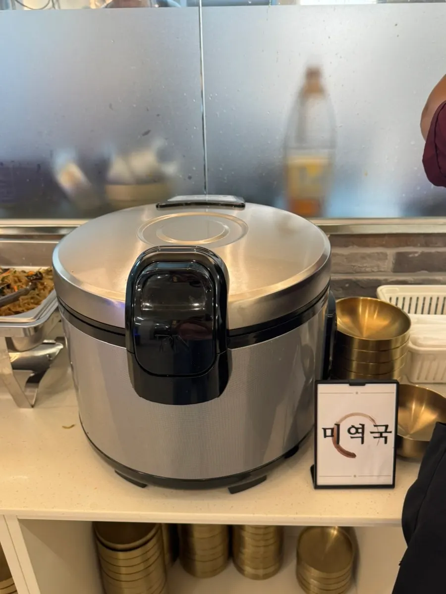 Kimchi and japchae at the self-serve bar
