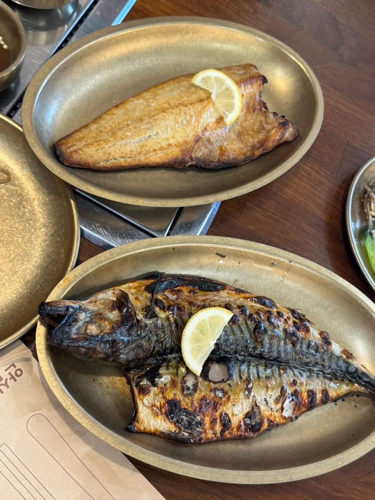 Full spread of wood-fired mackerel and atka mackerel set
