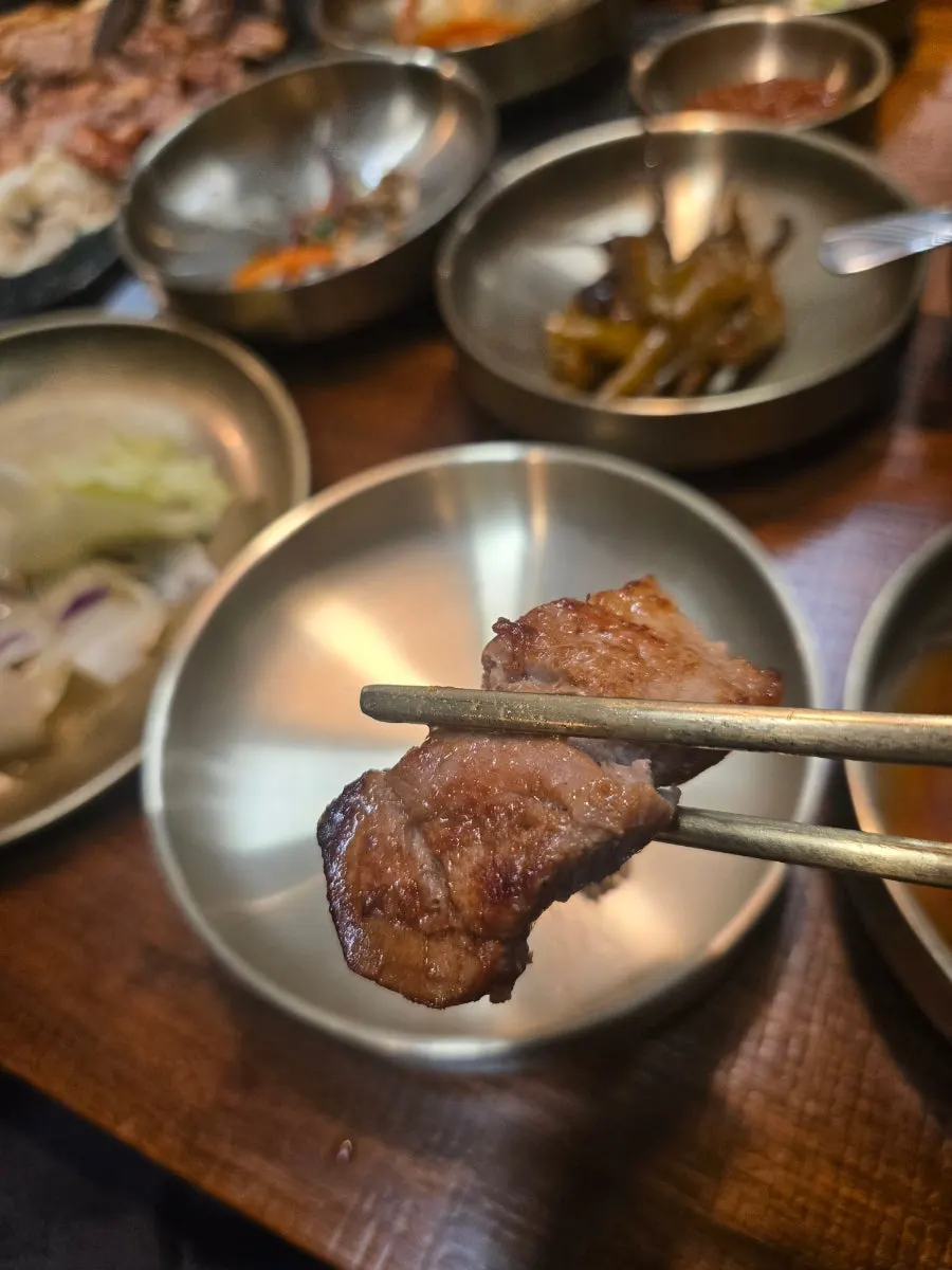 Pork belly enjoyed with aged kimchi