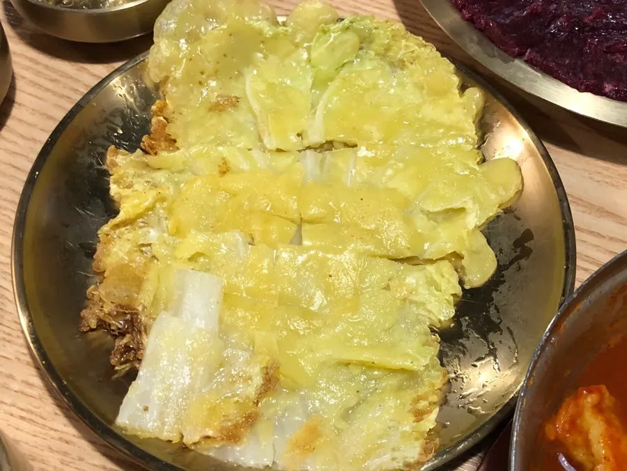 Pink sausage pancake, cabbage pancake, and tteokbokki in broth