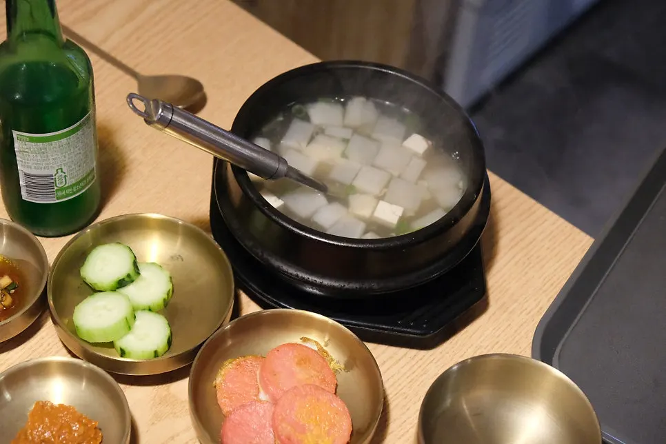 Beef soup, tteokbokki and cabbage pancake side dishes