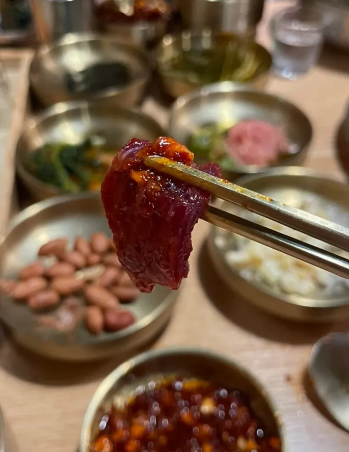 Raw beef with its dipping sauce