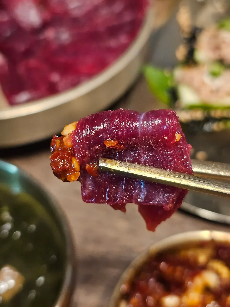 Mungtigi raw beef served with dipping sauce