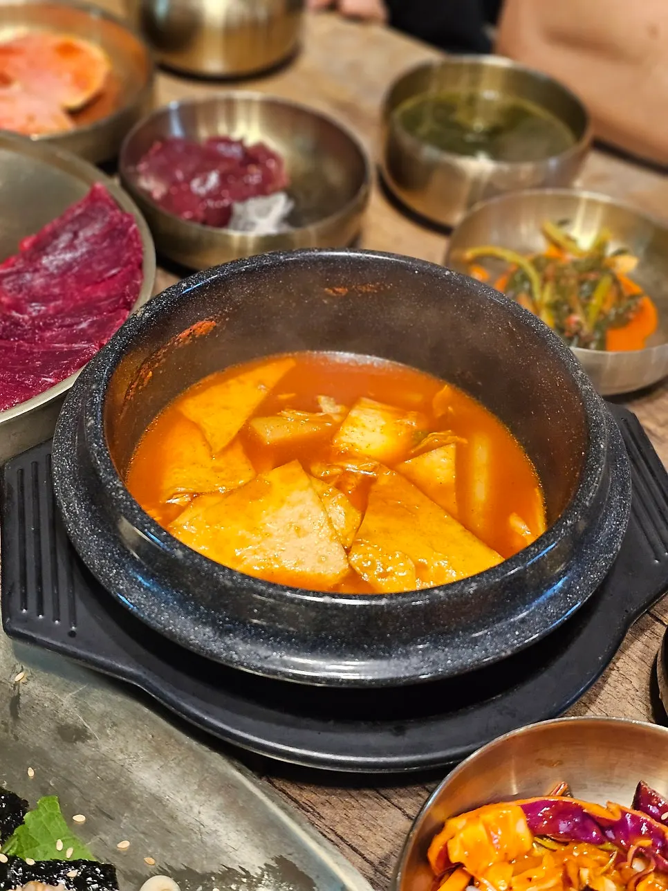 Tteokbokki and cabbage pancake served afterward