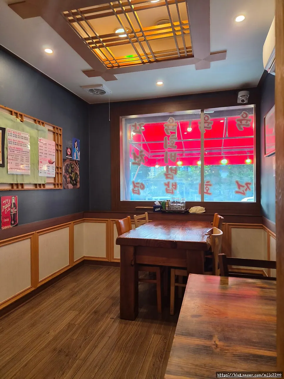 Interior with wooden decor and stained-glass lighting