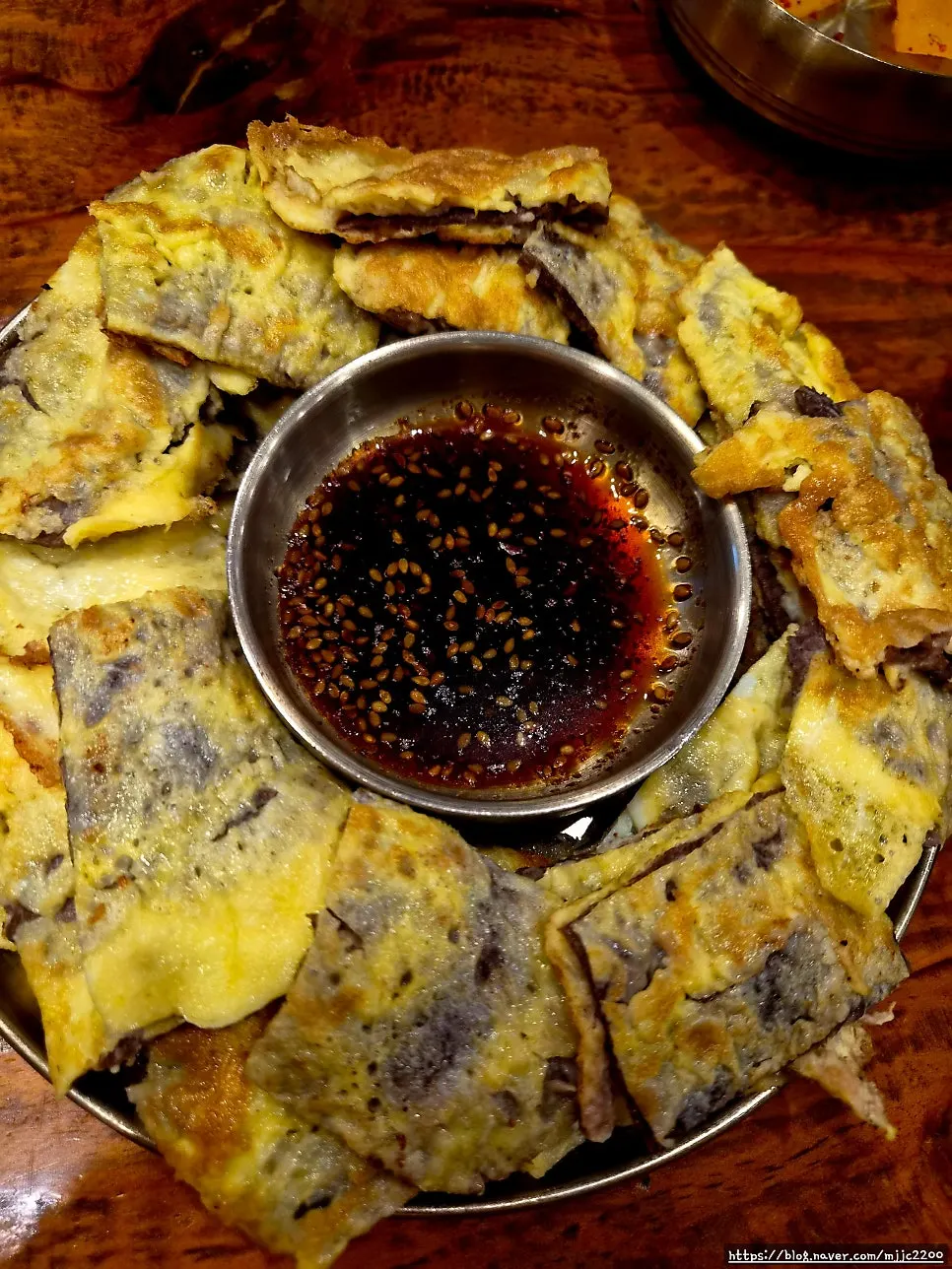 Plate of golden pan-fried yukjeon