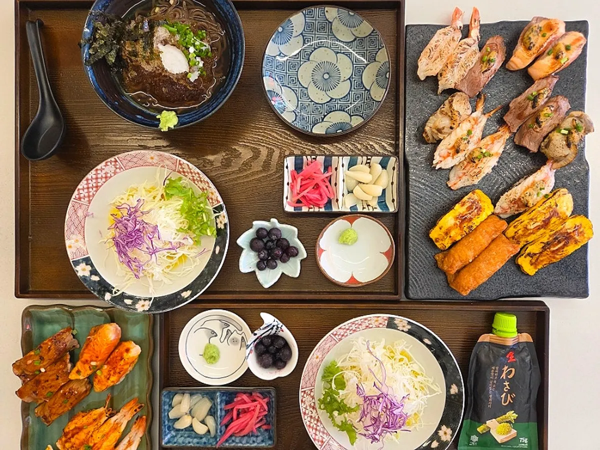 Full table spread of the Sushi Hwa flame-seared sushi set