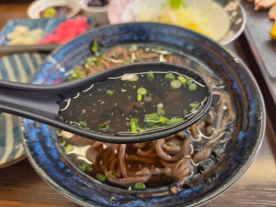 Two bowls of cold soba served first