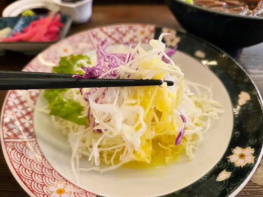Salad topped with yuzu dressing