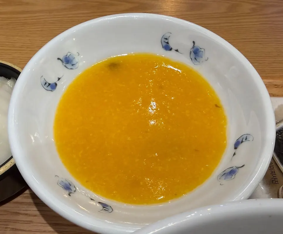 Pumpkin porridge set among the rice and side dishes