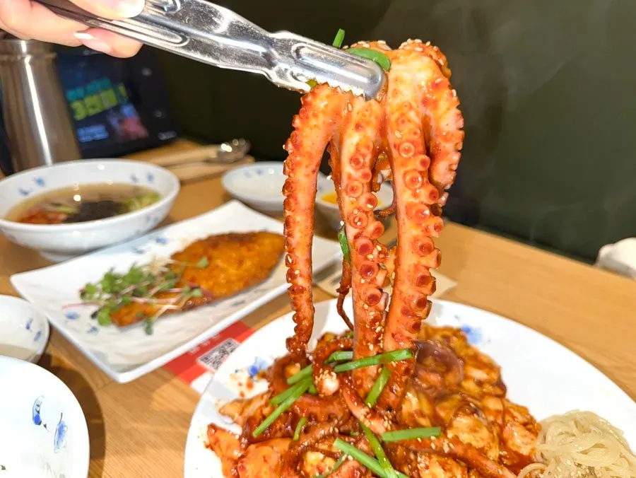 Whole octopus stir-fry served in one large piece