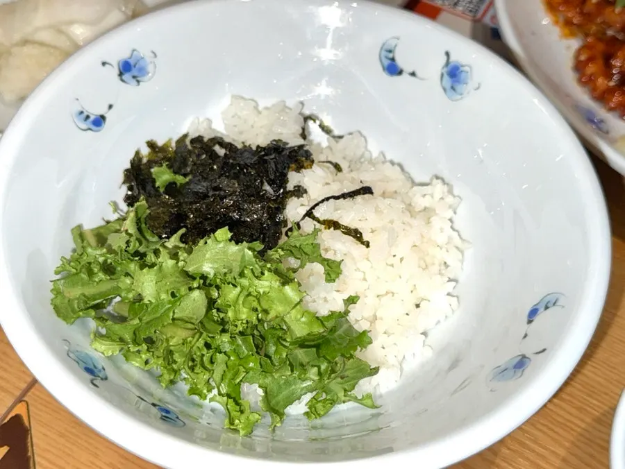Jjolmyeon noodles served alongside the octopus stir-fry