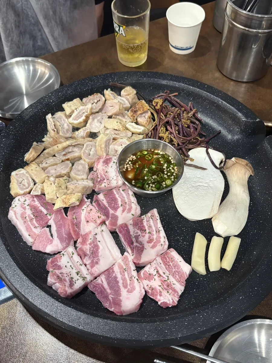 Table set with the one-plate-plus-one-plate Bongja Platter order