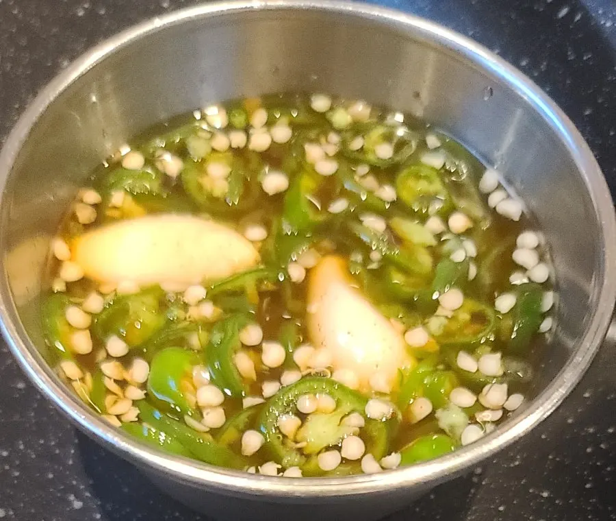 Basic side dish spread with shredded scallion and kimchi