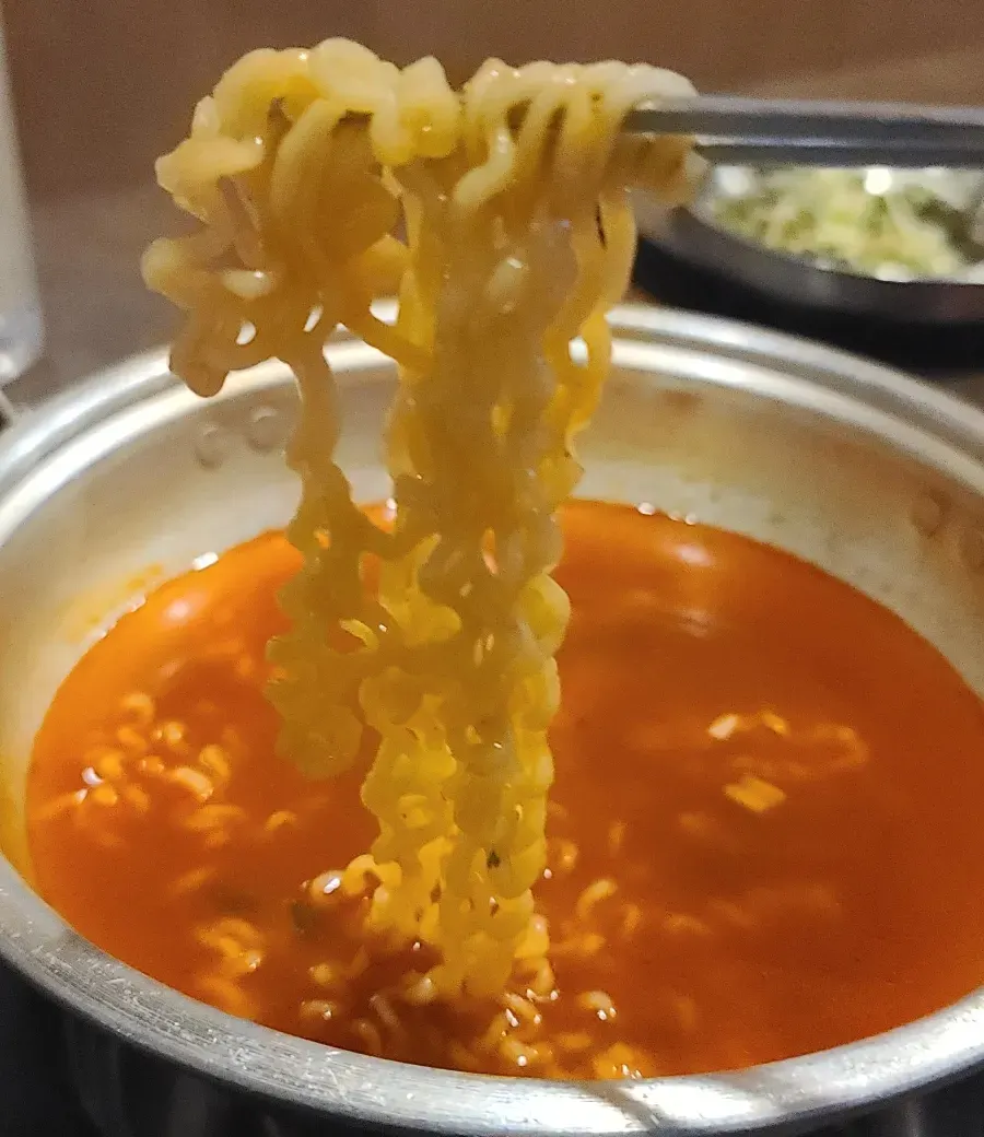 Self-cooked ramyeon prepared at the table