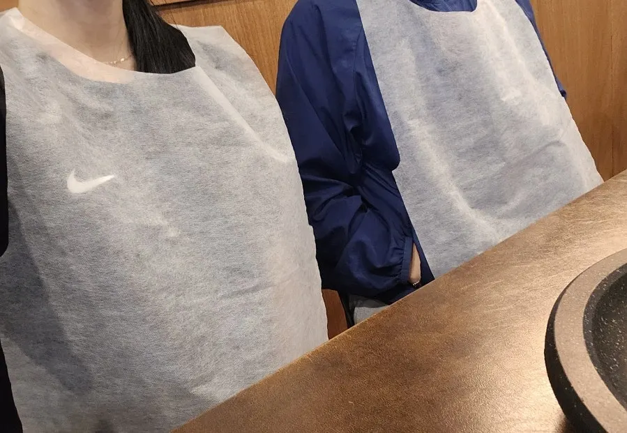 Aprons brought out for each guest