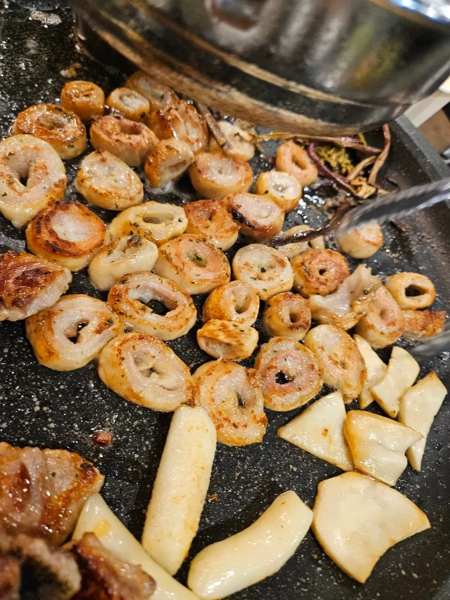 Close-up of crispy grilled makchang
