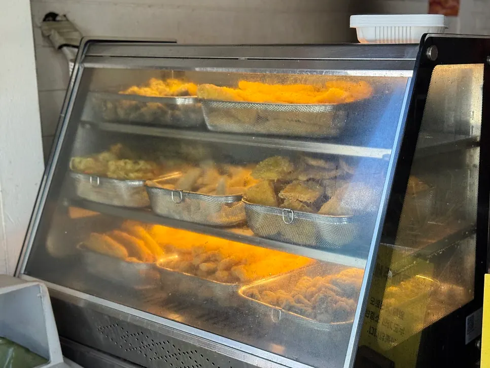 Fritters and tteokbokki display at the left entrance