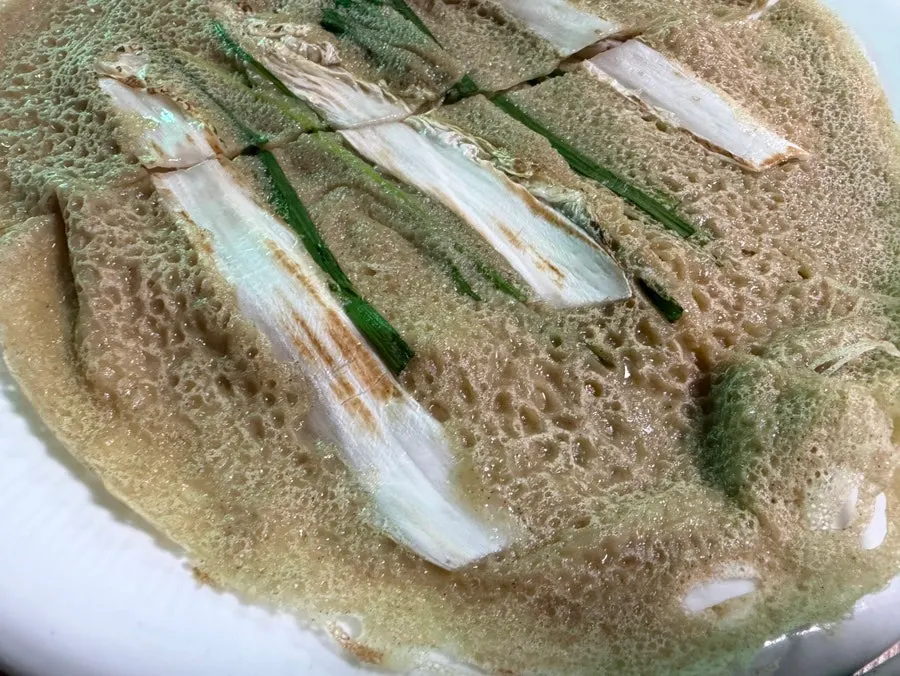 House-made buckwheat pancake with napa cabbage and scallions