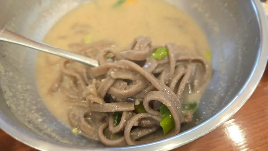 Table set with both makguksu and kalguksu dishes together
