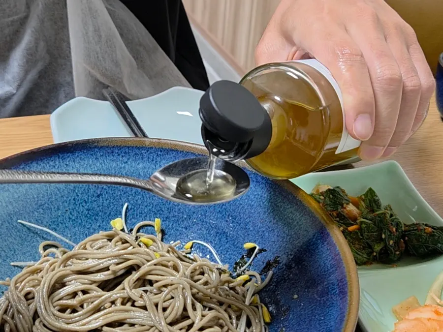 Makguksu broth with a light layer of ice slush