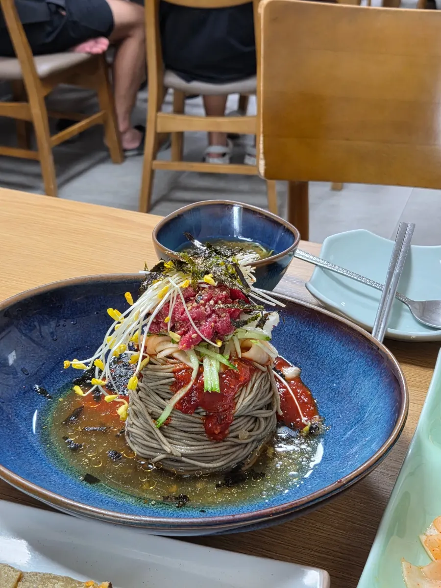 Yukhoe bibim makguksu topped with Pyeongchang hanwoo yukhoe