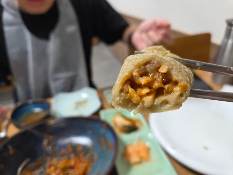 A spread of buckwheat makguksu and memil-jeon