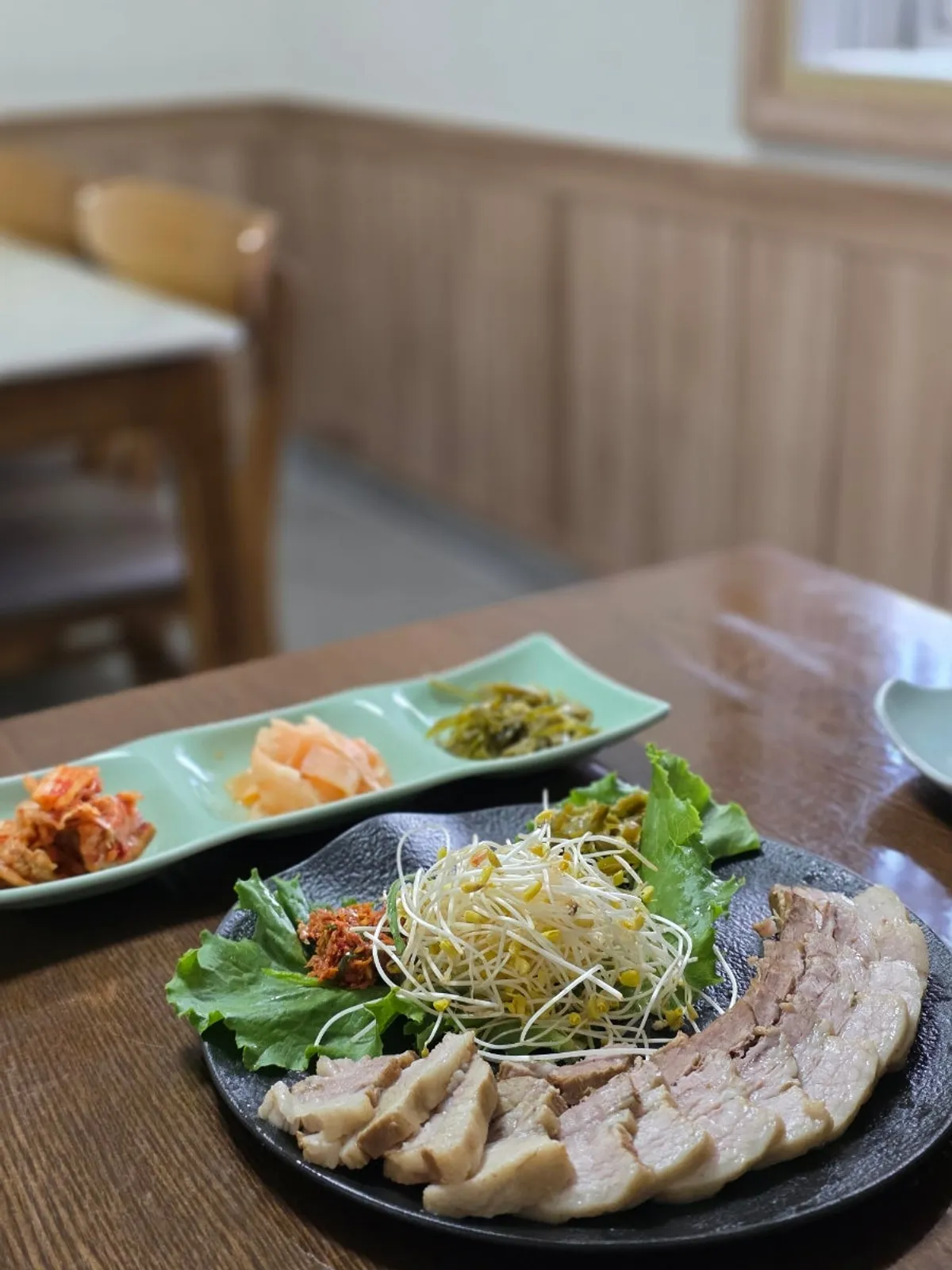 Plate of buckwheat-sprout boiled pork