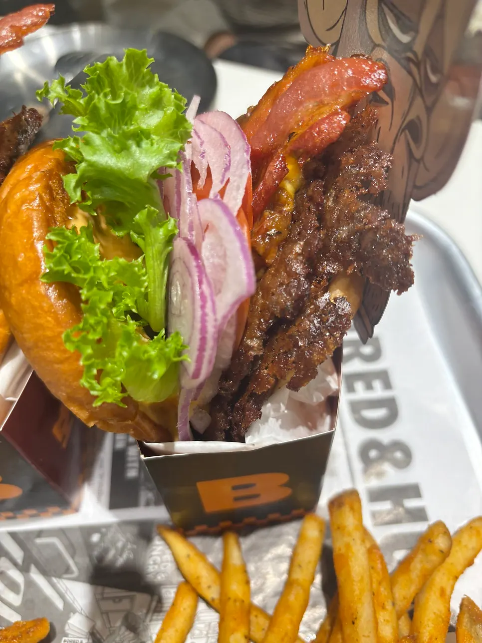 Cross-section of the double burger with two flat-grilled patties