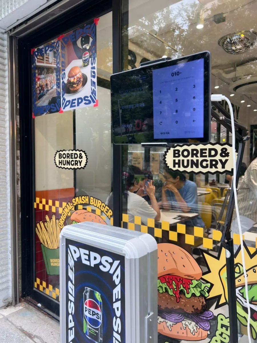 Wait list registration machine outside the store