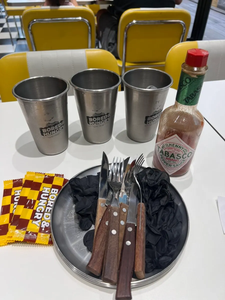 Cup and cutlery grabbed from the self-bar
