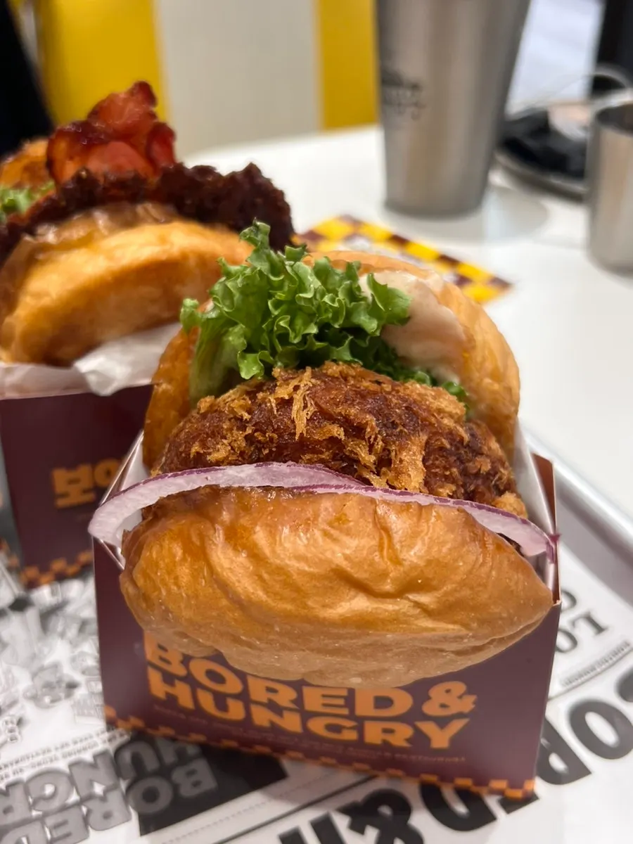 Shrimp OG burger with a thick shrimp patty