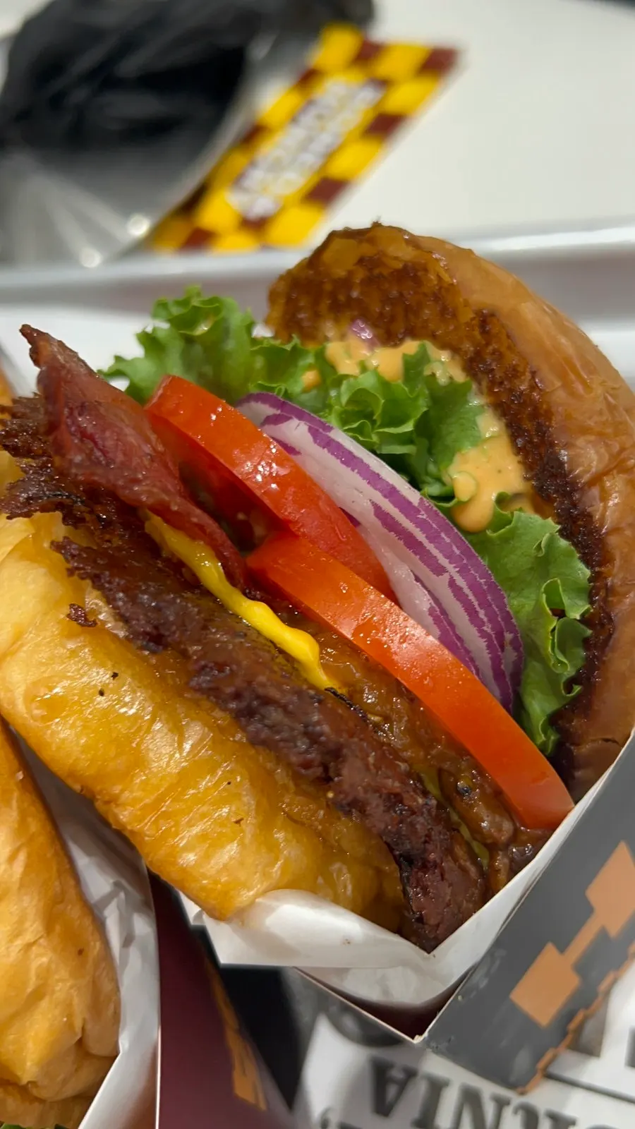 Deluxe burger with crispy grilled bacon