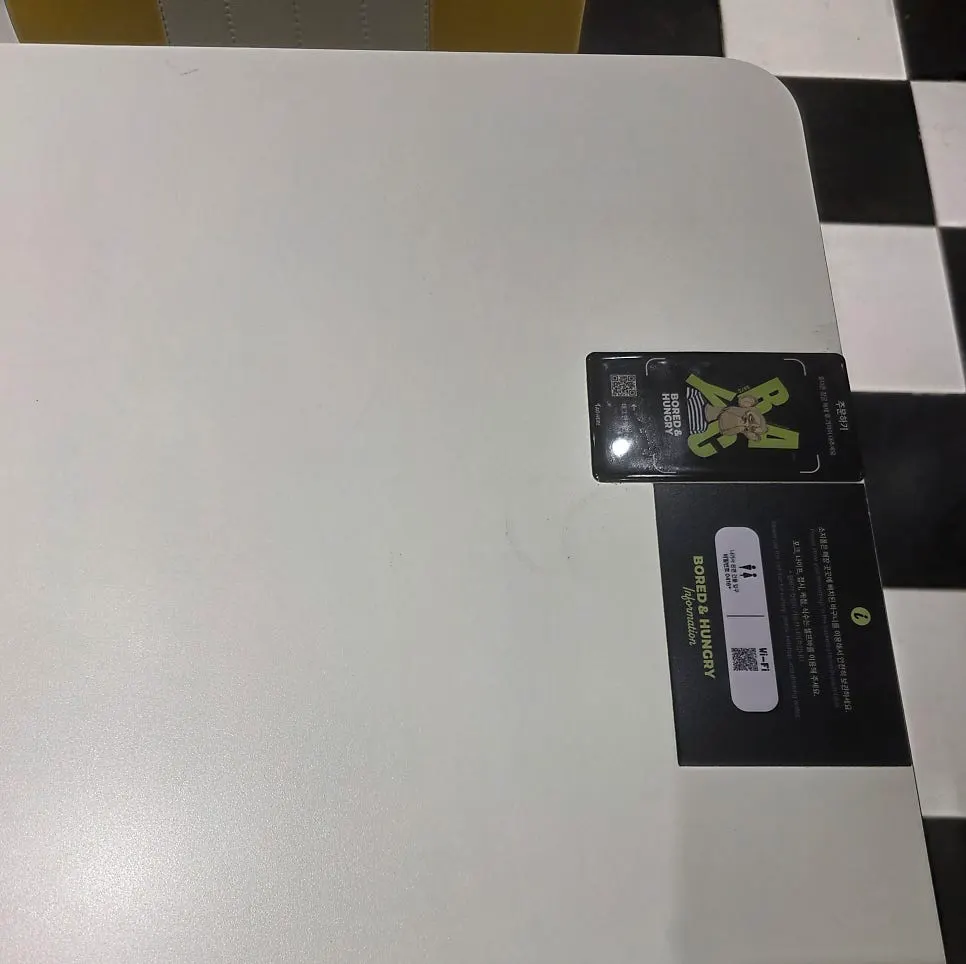 NFC tag and QR code ordering sign on the table