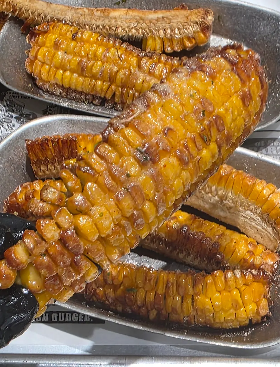 Corn ribs served with dipping sauce