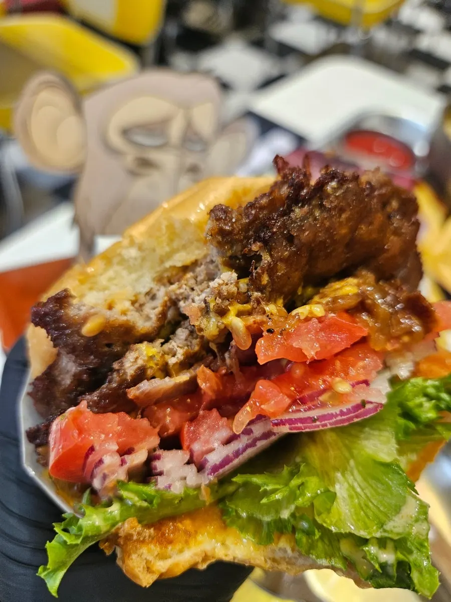 Fresh vegetables packed inside the handmade burger