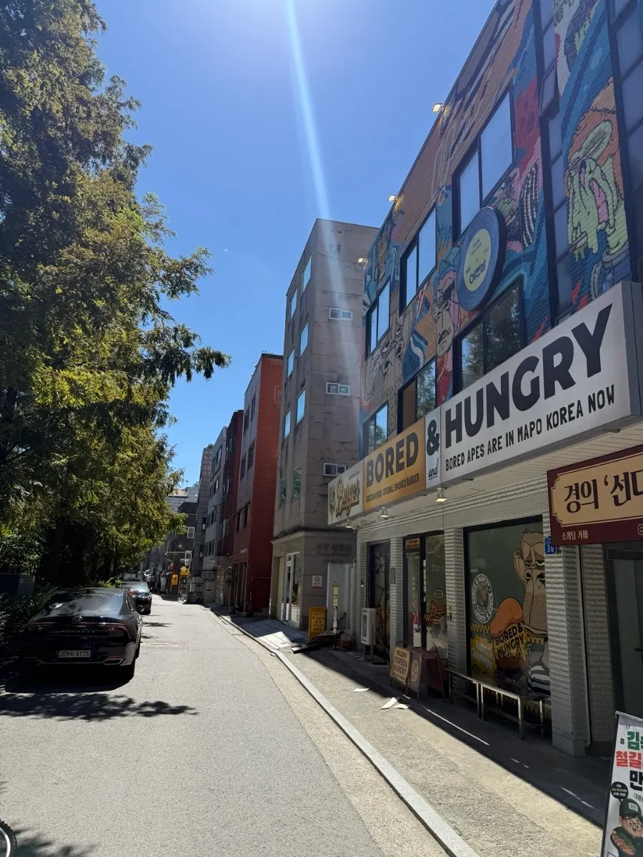 Exterior of Bored & Hungry Mapo next to the Gyeongui Line Forest trail