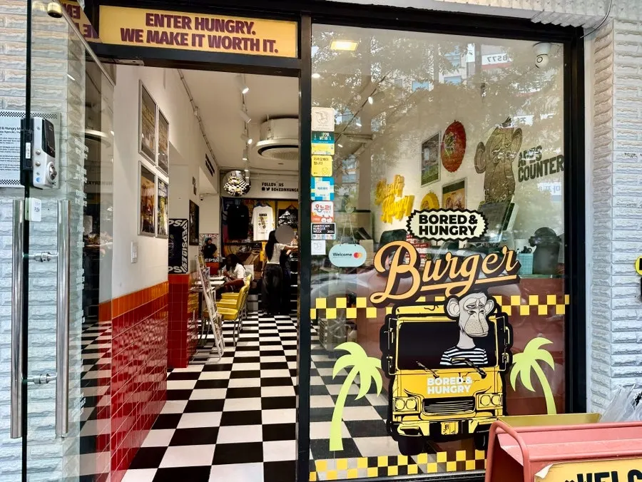 Exterior of Bored & Hungry Mapo covered in art graphics