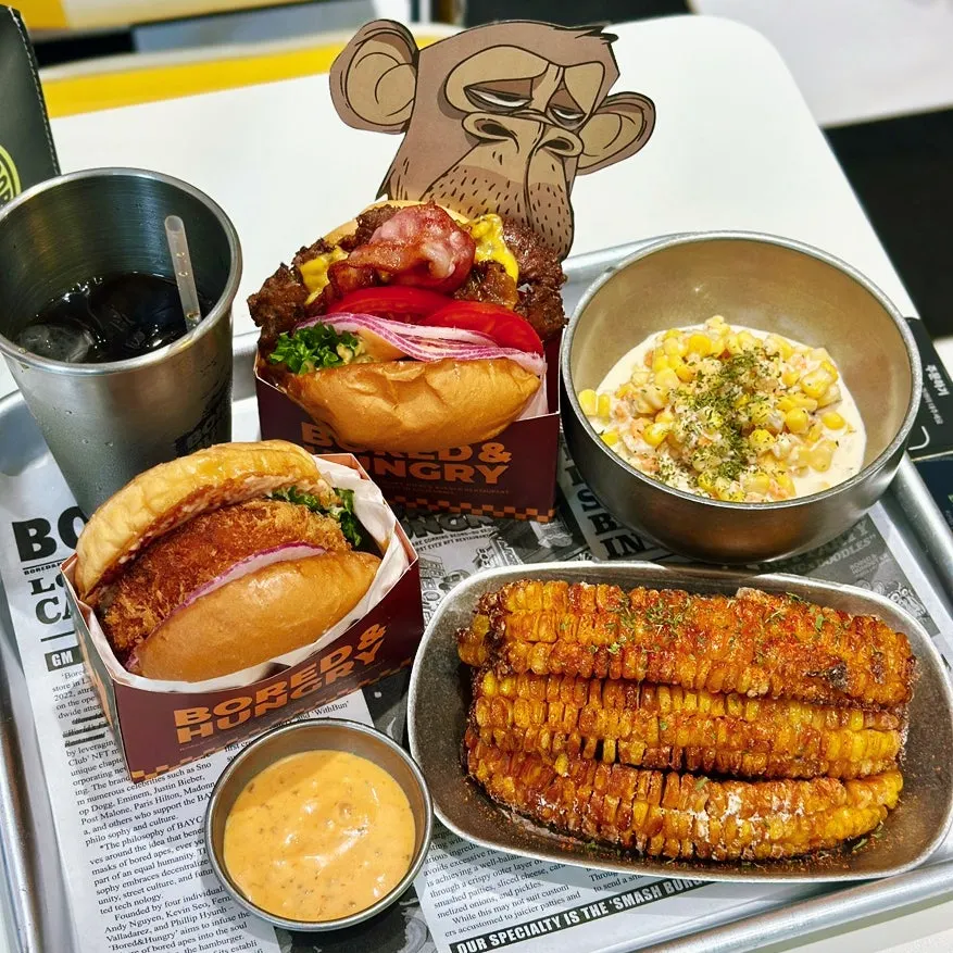 Burgers and sides set out on the table