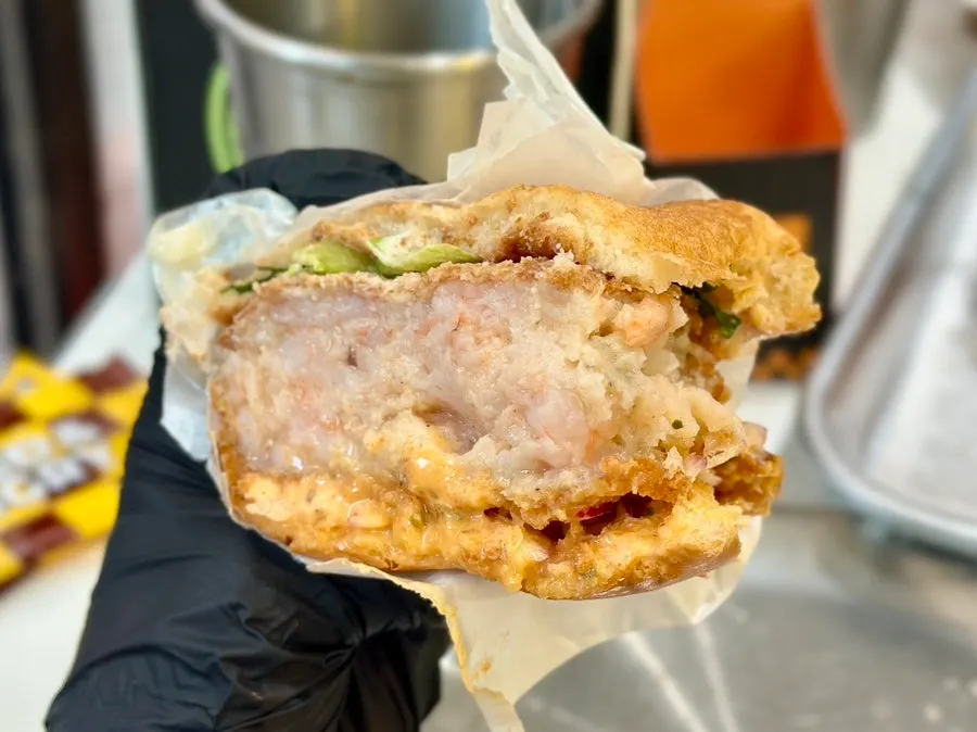 Cross-section of the Shrimp O.G. burger showing shrimp